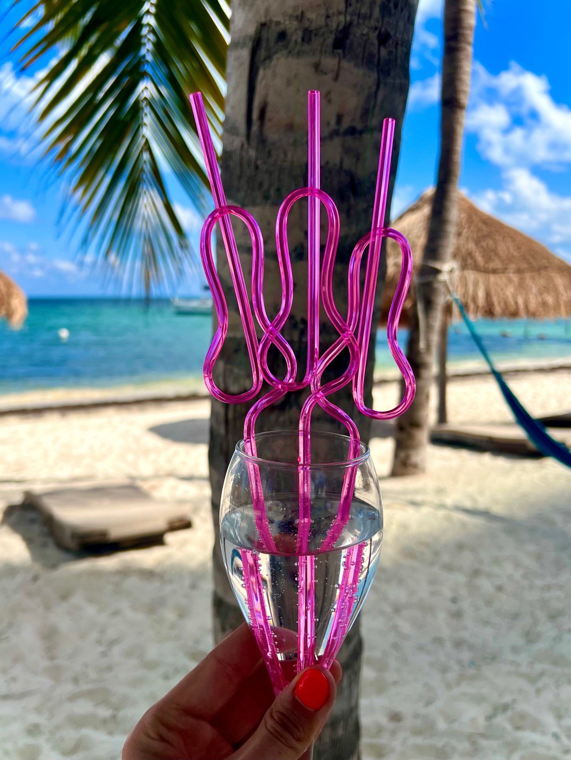 Vibrant pink straws for events